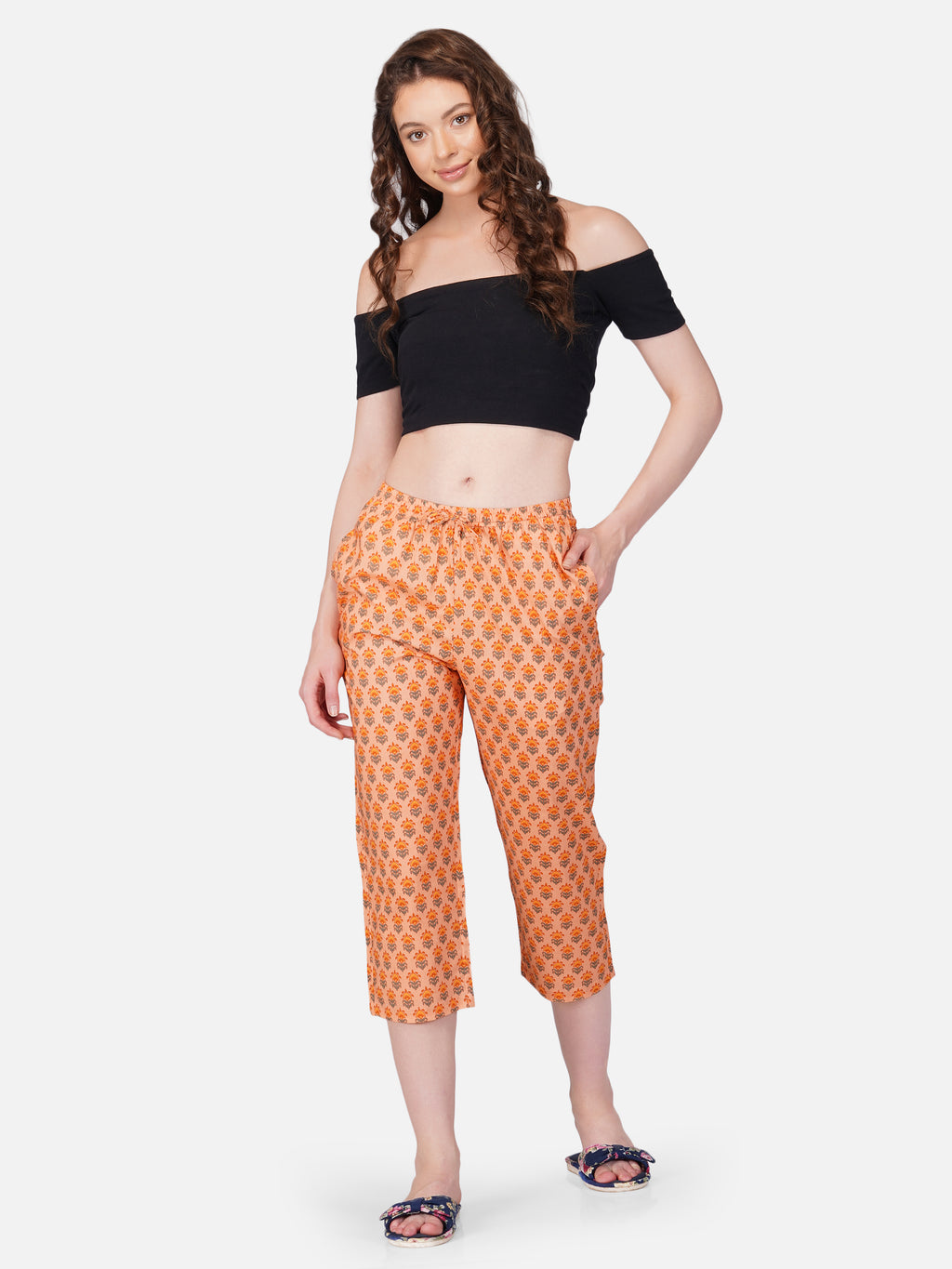 Orange floral motif printed capris - thebriefsstory