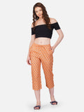 Orange floral motif printed capris - thebriefsstory