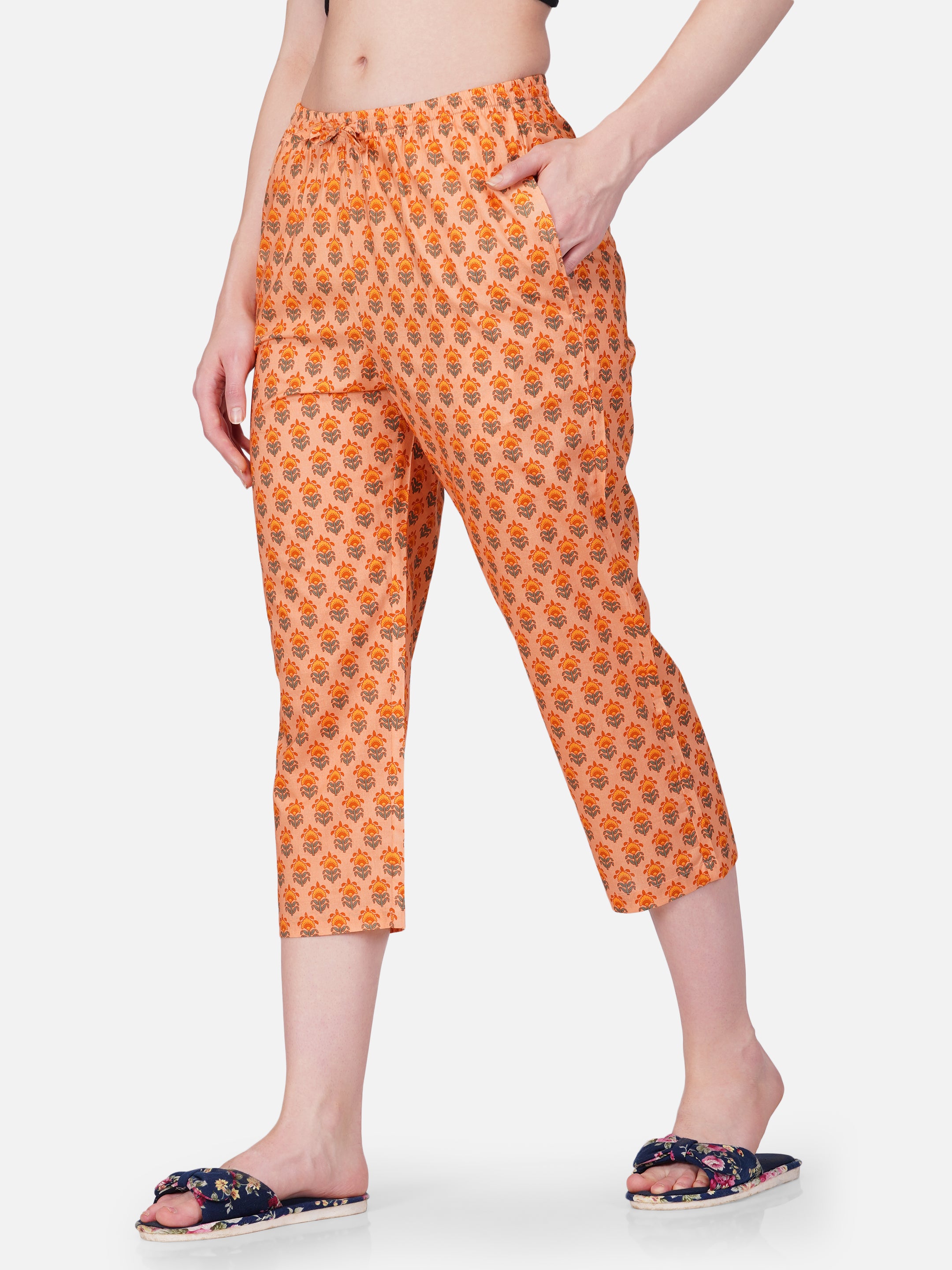 Orange floral motif printed capris - thebriefsstory