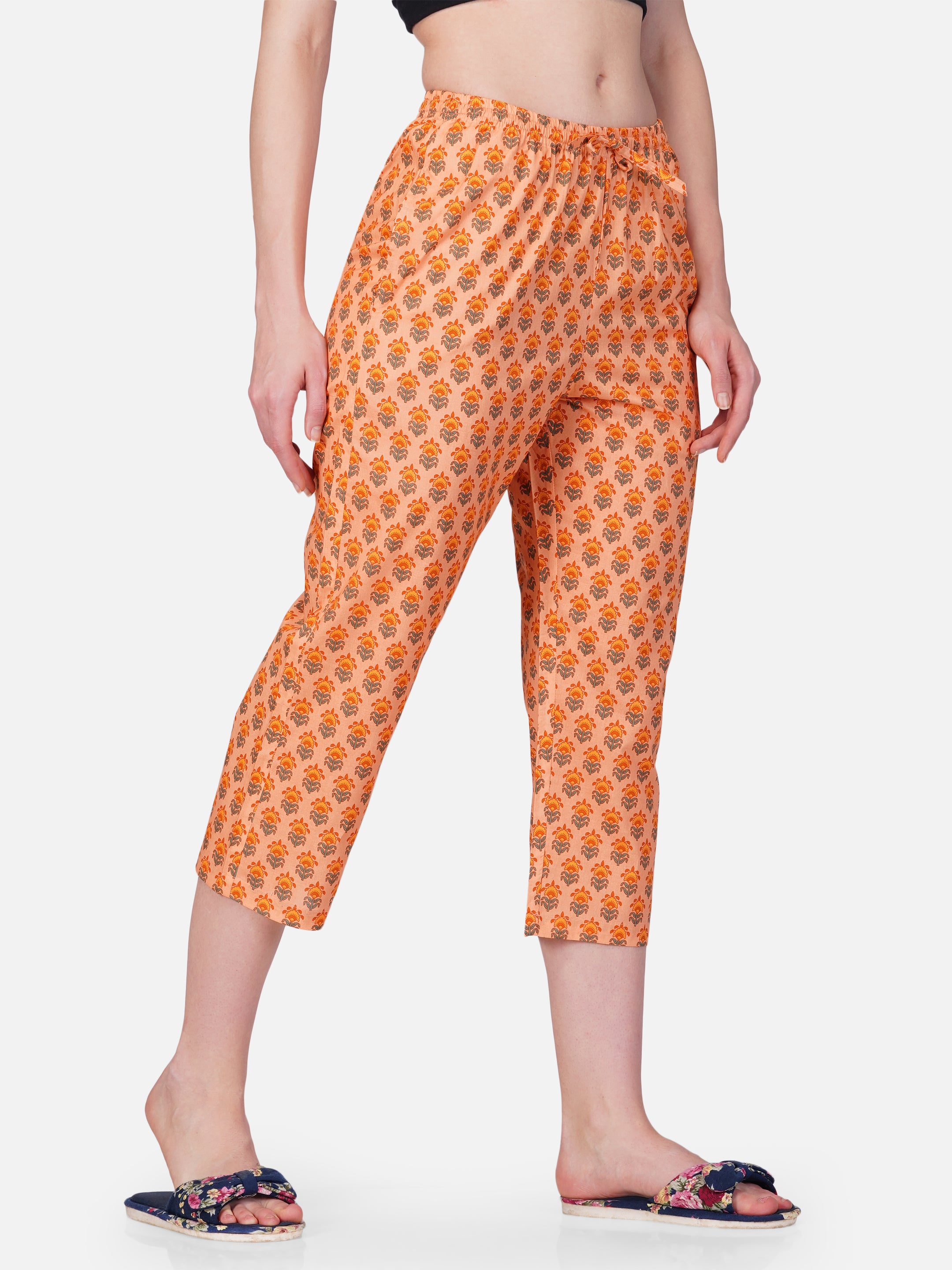 Orange floral motif printed capris - thebriefsstory