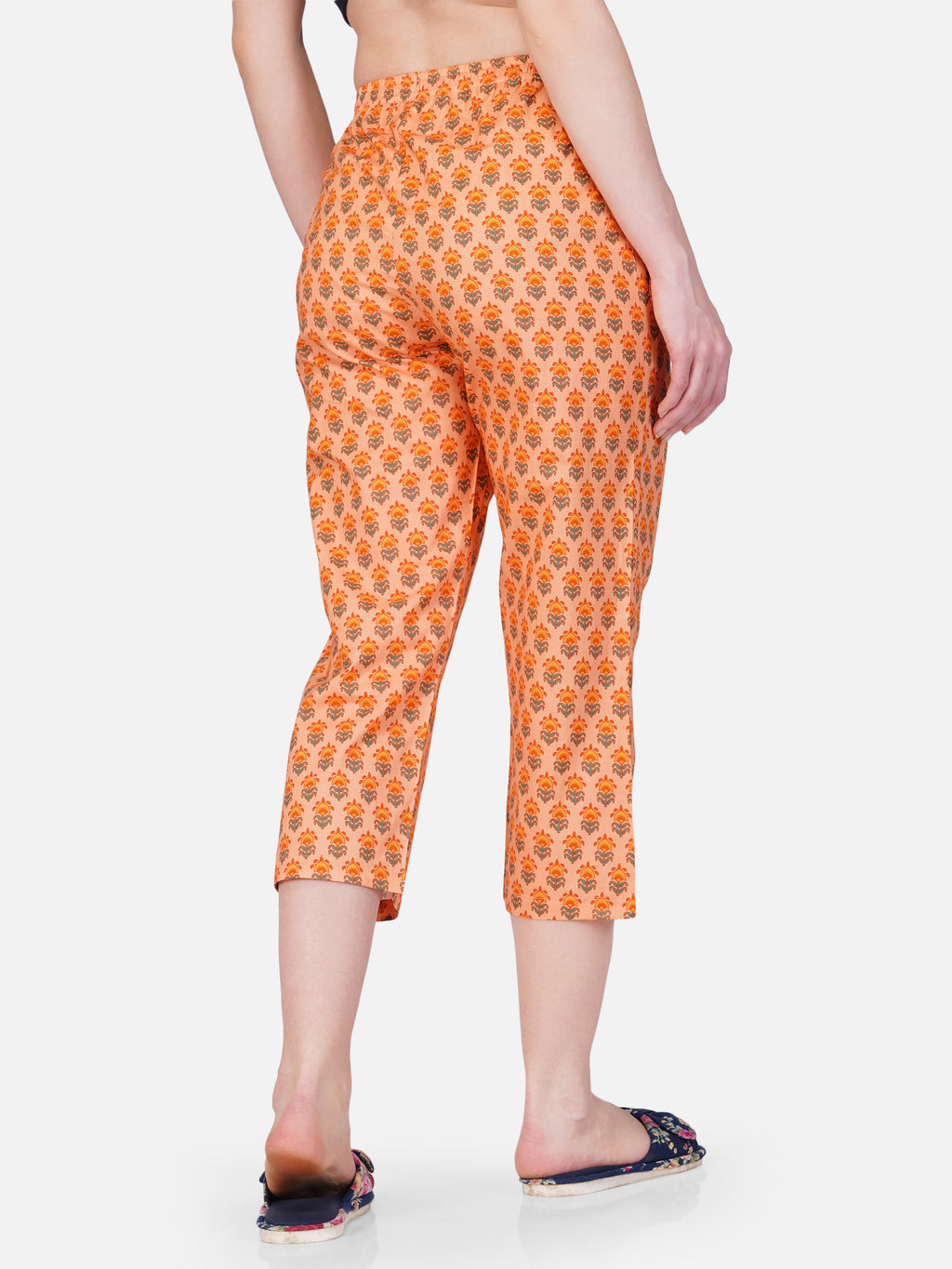 Orange floral motif printed capris - thebriefsstory