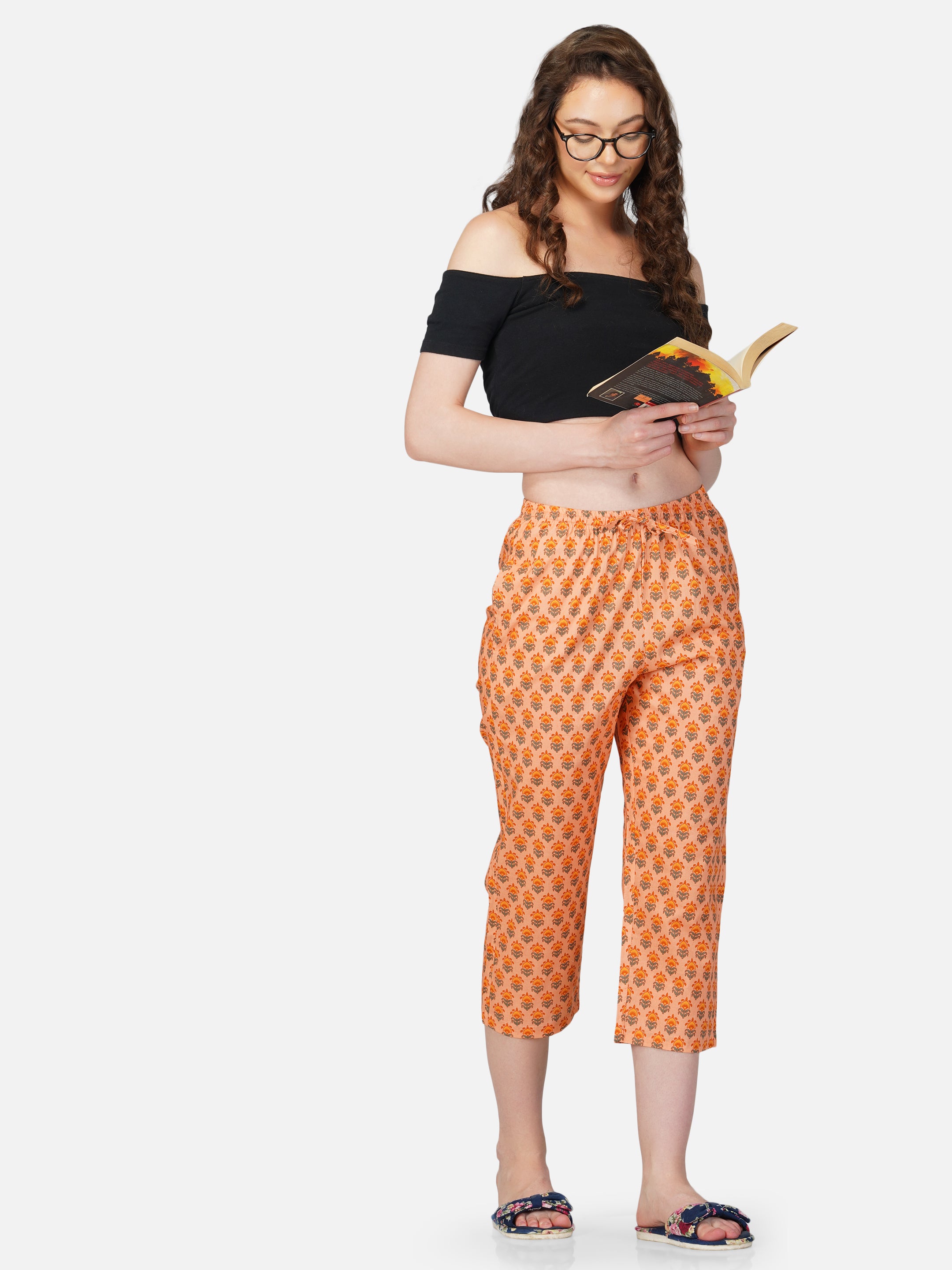 Orange floral motif printed capris - thebriefsstory